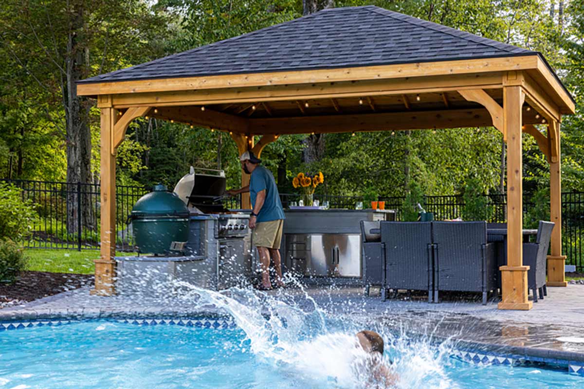 Pool with Outdoor Kitchen and Dining Area